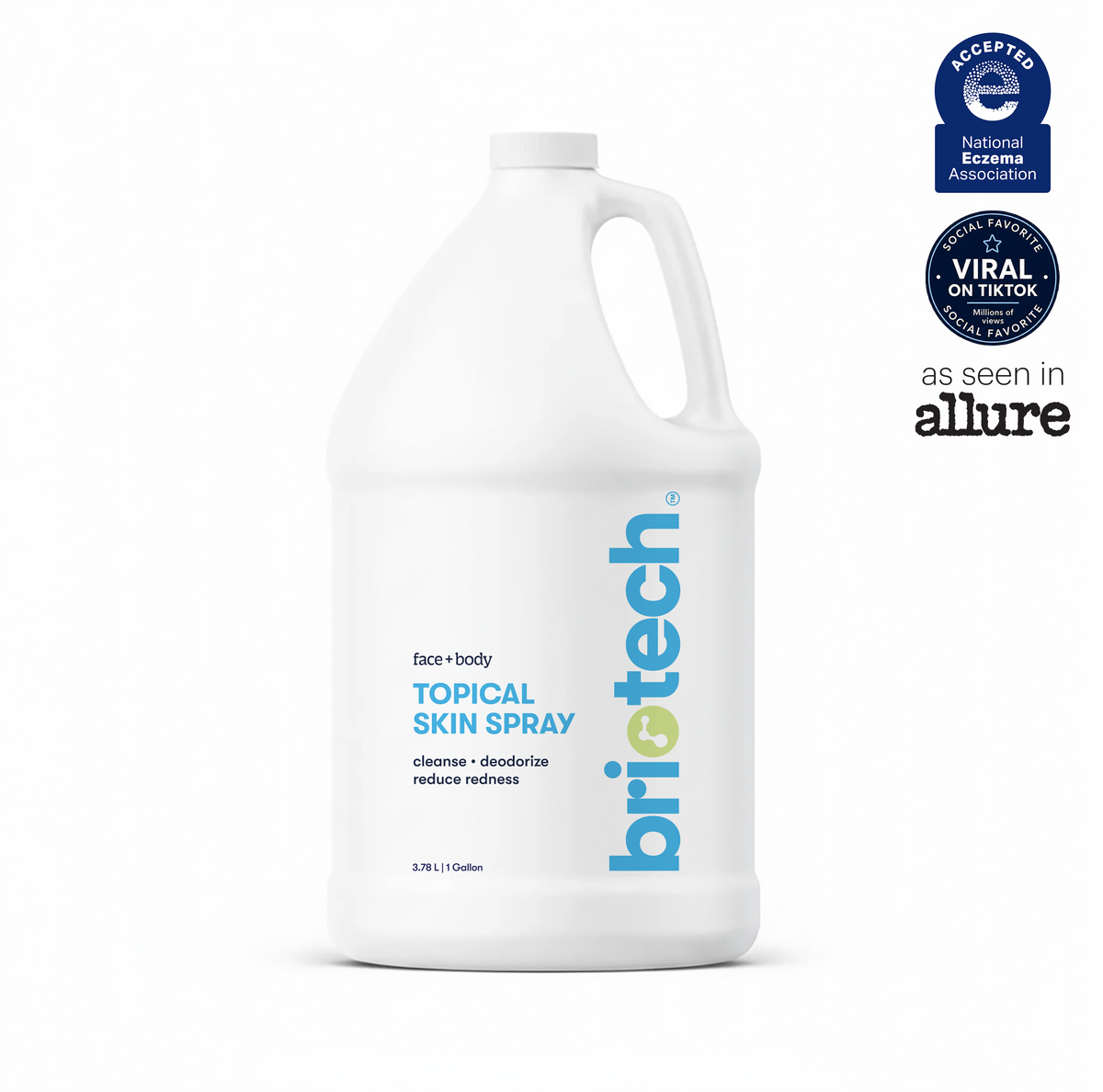 A white gallon bottle labeled Topical Skin Spray features blue and gray text. Three badges at the top right showcase endorsements and media mentions, including recognition from the National Eczema Association and Allure. This soothing spray is specially formulated to calm irritation and promote healthier-looking skin.