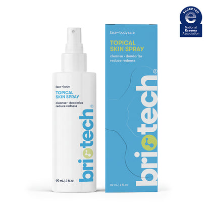 A 60 mL (2 fl oz) white spray bottle of Topical Skin Spray for face and body. The label highlights cleanse, deodorize, and reduce redness. This soothing spray helps calm irritation and refresh your skin.
