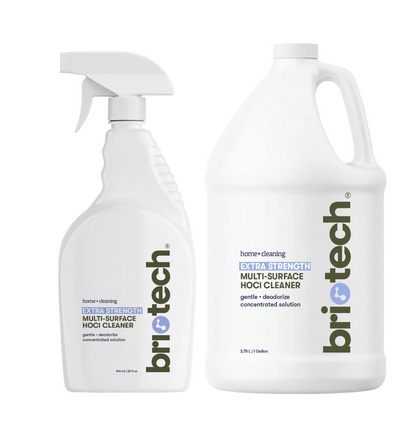 The Extra Strength HOCl Bundle includes two white bottles—a spray bottle and a gallon jug—both labeled for home cleaning, gentle deodorizing, and concentrated chemical-free power with a non-toxic formula.