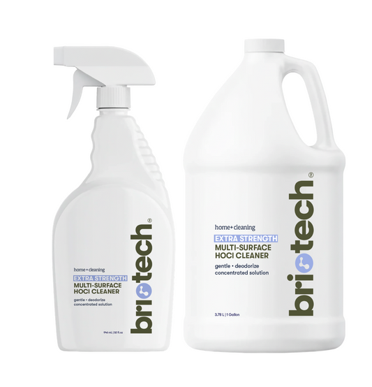 The Extra Strength HOCl Bundle includes two white bottles—a spray bottle and a gallon jug—both labeled for home cleaning, gentle deodorizing, and concentrated chemical-free power with a non-toxic formula.