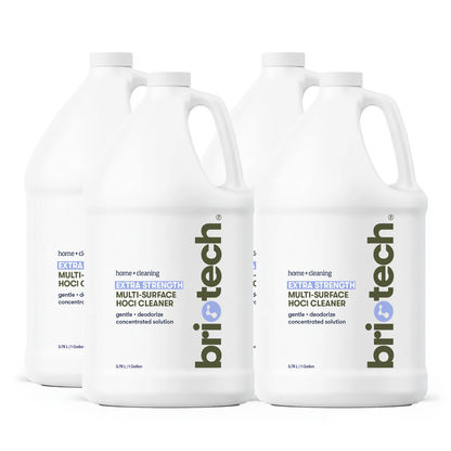 Four white gallon bottles of Extra Strength HOCl cleaner are arranged in two rows; the front labels highlight advanced, concentrated cleaning for hard non-porous surfaces with a gentle, deodorizing formula.