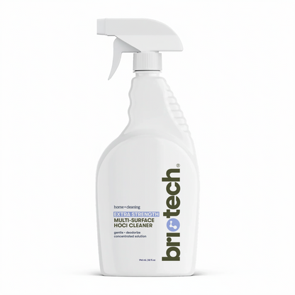 A white spray bottle labeled “Extra Strength HOCl” contains a powerful multi-surface cleaner concentrate, designed for advanced cleaning and deodorizing of hard non-porous surfaces—ideal for home use.