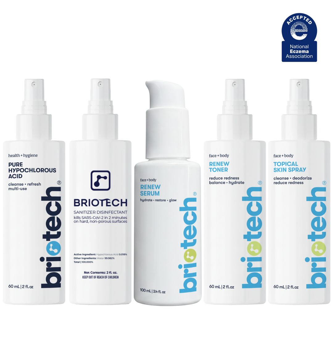 Five white Briotech HOCl bottles from the Travel Essentials Kit—Pure Hypochlorous Acid, Sanitizer Disinfectant, Renew Serum, Renew Toner, and HOCl spray—are lined up with a National Eczema Association seal shown above.
