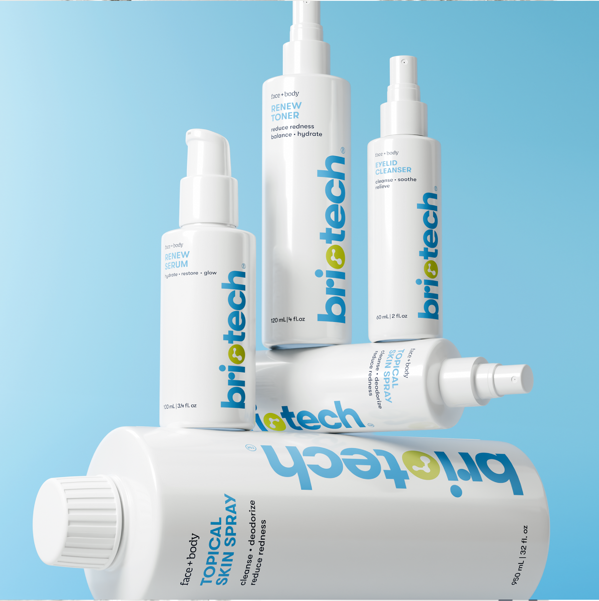 Five white spray bottles of various sizes, including a Renew Toner, are stacked against a blue background; each is labeled with its product name, intended purpose, and volume.
