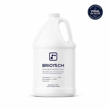 A white gallon jug of Sanitizer Disinfectant features blue label text, with a circular badge in the corner that says “Viral on TikTok” and “Social Favorite.” Set against a plain white background, this disinfecting spray effectively eliminates bacteria and viruses on non-porous surfaces.