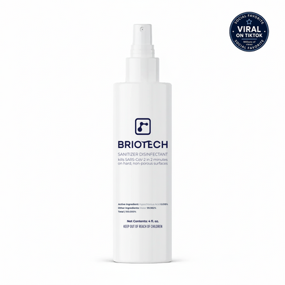 A white spray bottle of Briotech Sanitizer Disinfectant featuring a blue logo and text is shown against a plain white background. In the top right corner, a badge reads “Viral on TikTok” and “Social favorite.” This effective Sanitizer Disinfectant spray eradicates bacteria and viruses from non-porous surfaces.