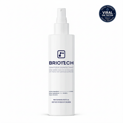 A white bottle of Sanitizer Disinfectant with a spray top, featuring text describing its effectiveness against SARS-CoV-2, and a blue circular “Viral on TikTok” badge in the top right corner. Ideal for cleaning non-porous surfaces and effective against bacteria and viruses.