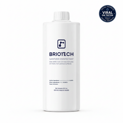 A white bottle labeled Sanitizer Disinfectant features blue text and a label stating it kills SARS-CoV-2 in two minutes, making it an effective spray for disinfecting non-porous surfaces. A blue “Viral on TikTok” seal appears in the upper right corner.