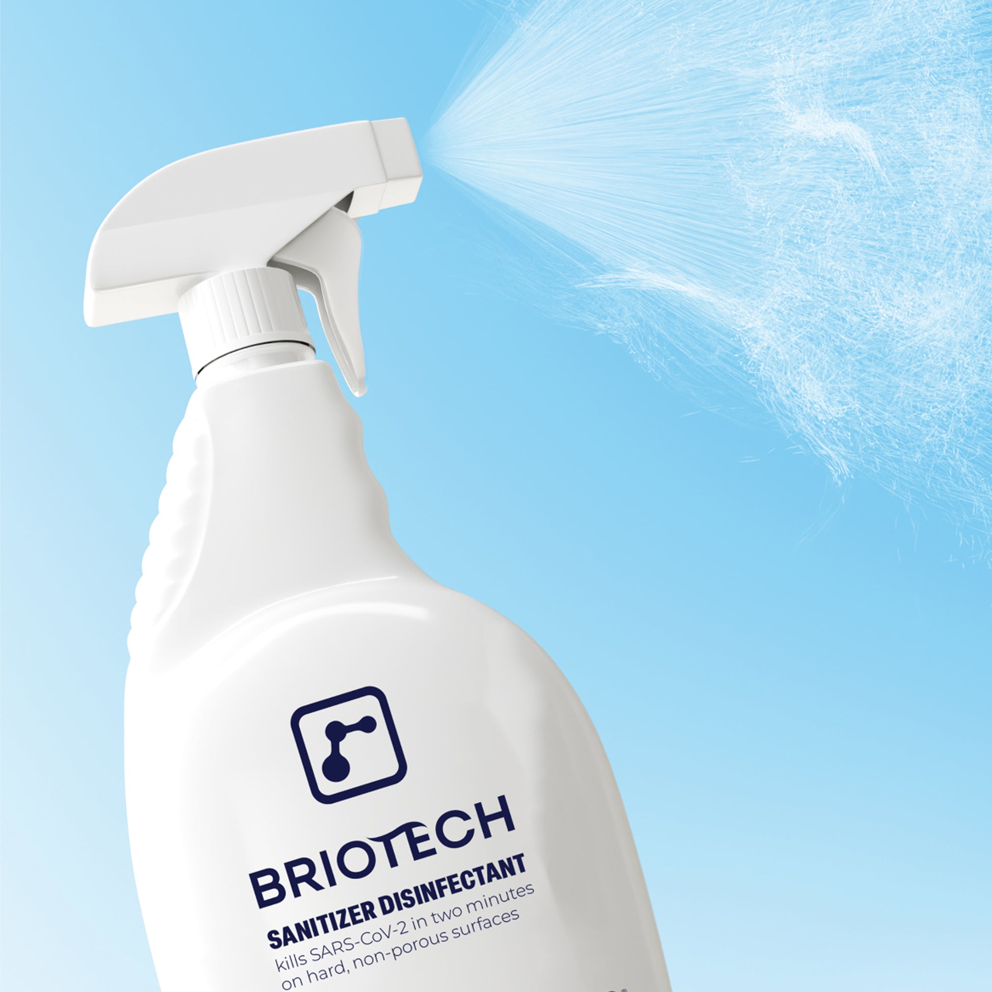 A white spray bottle labeled Sanitizer Disinfectant releases a mist on a light blue background. This disinfecting spray kills SARS-CoV-2 and eliminates bacteria and viruses on hard, non-porous surfaces in two minutes.