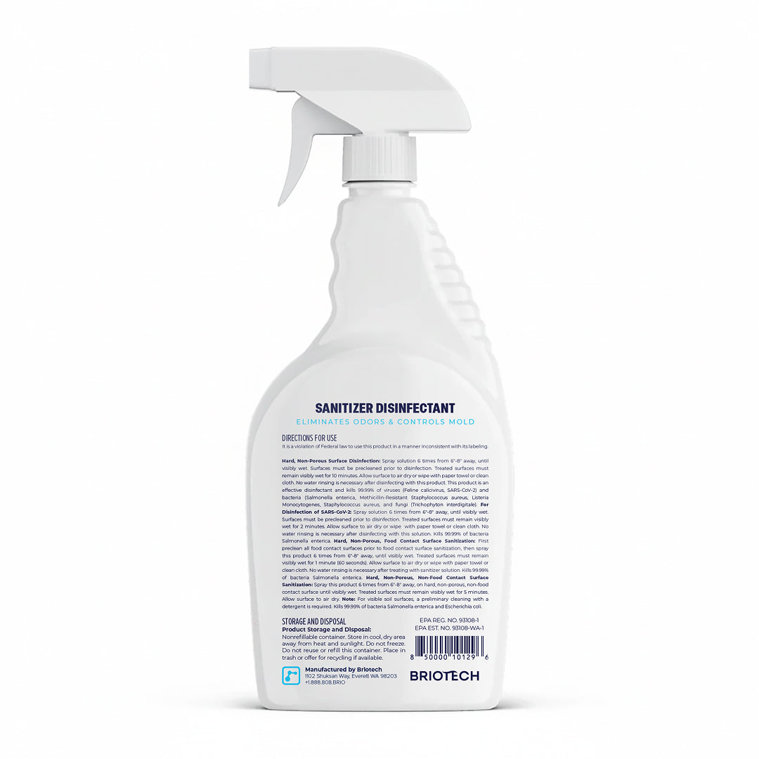 A white spray bottle labeled Sanitizer Disinfectant, ideal for non-porous surfaces, features directions and product info in blue and black text on the back. The brand name BRIOTECH is displayed at the bottom.