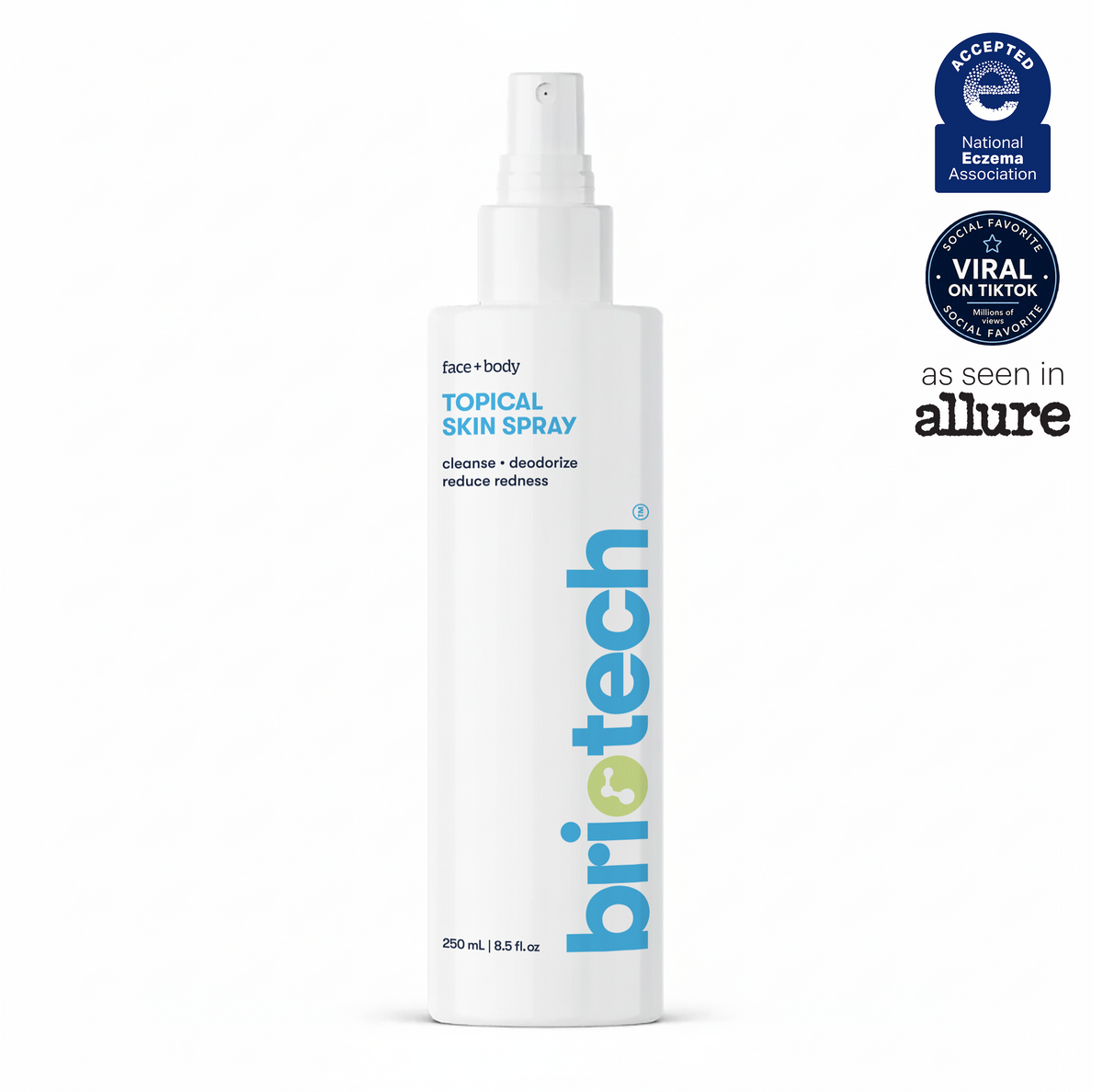White bottle labeled Topical Skin Spray with blue and green text. Certifications include the National Eczema Association seal and a “Viral on TikTok” badge. The text features “as seen in Allure.” This soothing spray is formulated to calm irritation and reduce blemishes, making it a gentle option for sensitive skin.