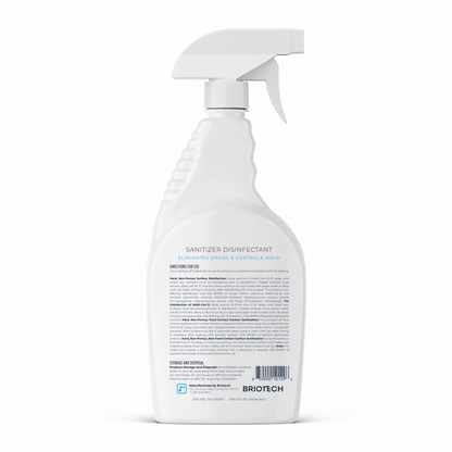 A white spray bottle labeled “Sanitizer Disinfectant” stands upright against a plain white background. It is designed for disinfecting non-porous surfaces, and its label provides information on uses, directions, and the manufacturer, Briotech.